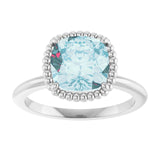 Cushion Sky Blue Topaz Solitaire Ring in Gold and Platinum