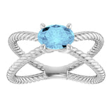 Oval Aquamarine Solitaire Ring in Gold and Platinum