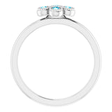 Round Aquamarine Accented Ring in Gold and Platinum