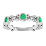 Round Emerald & Diamond Accented Ring in Gold and Platinum