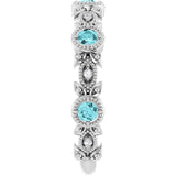Round Blue Zircon & Diamond Accented Ring in Gold and Platinum
