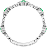 Round Emerald & Diamond Accented Ring in Gold and Platinum