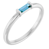 Straight Baguette Swiss Blue Topaz Ring in Gold and Platinum