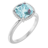 Cushion Sky Blue Topaz Solitaire Ring in Gold and Platinum
