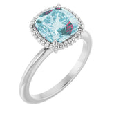 Cushion Sky Blue Topaz Solitaire Ring in Gold and Platinum