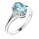 Oval Sky Blue Topaz & Diamond Accented Ring in White Gold