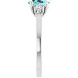 Oval Blue Zircon Accented Ring with Diamond Accents in Gold