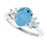Oval Swiss Blue Topaz Accented Ring with Diamond Accents in Gold