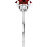 Oval Mozambique Garnet Accented Ring with Diamond Accents in Gold