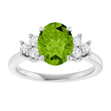 Oval Peridot Accented Ring with Diamond Accents in Gold