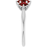Oval Mozambique Garnet Three Stone Ring in Gold and Platinum