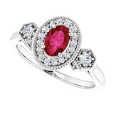 Oval Lab-Grown Ruby & Diamond Halo Ring in Gold and Platinum