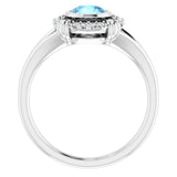Round Aquamarine & Diamond Halo Ring in Gold and Platinum