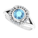 Round Aquamarine & Diamond Halo Ring in Gold and Platinum