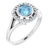 Round Aquamarine & Diamond Halo Ring in Gold and Platinum