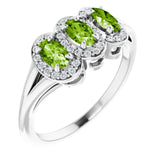 Oval Peridot & Diamond Three Stone Ring in Gold and Platinum