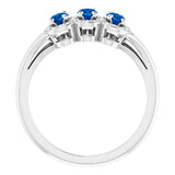 Oval Blue Sapphire & Diamond Three Stone Ring in Gold and Platinum