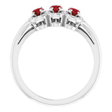 Oval Mozambique Garnet & Diamond Ring in Gold and Platinum