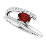 Oval Mozambique Garnet & Diamond Accented Ring in Gold and Platinum