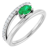Oval Emerald & Diamond Accented Ring in Gold and Platinum