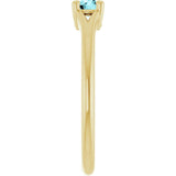 Round Blue Zircon Youth Ring in Yellow Gold