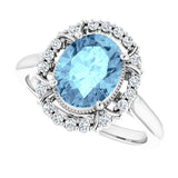 Oval Aquamarine Halo Ring with Diamond Accents in Gold and Platinum
