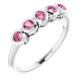Round Pink Tourmaline Accented Ring in Gold and Platinum