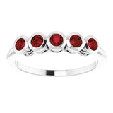 Round Mozambique Garnet Accented Ring in Gold and Platinum