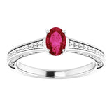 Oval Lab-Grown Ruby Solitaire Ring in Gold and Platinum