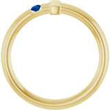 Round Blue Sapphire Crosses Ring in Yellow Gold