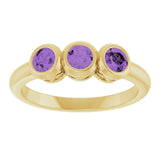 Round Amethyst Three Stone Ring in Yellow Gold