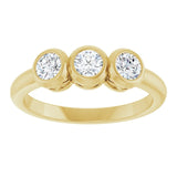Round White Sapphire Three Stone Ring in Yellow Gold