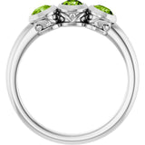Round Peridot Three Stone Ring in White Gold