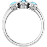 Round Aquamarine Three Stone Ring in White Gold
