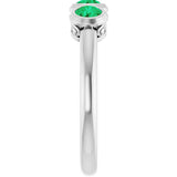 Round Emerald Three Stone Ring in White Gold
