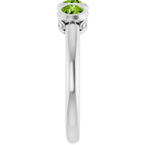 Round Peridot Three Stone Ring in Gold and Platinum