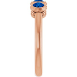 Round Lab-Grown Blue Sapphire Three Stone Ring in Rose Gold