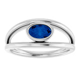 Oval Blue Sapphire Negative Space Ring in Gold and Platinum