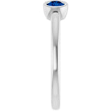 Round Blue Sapphire Negative Space Ring in Gold and Platinum