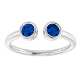 Round Blue Sapphire Negative Space Ring in Gold and Platinum