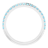 Round Aquamarine Crosses Ring in Gold and Platinum