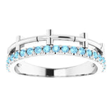 Round Aquamarine Crosses Ring in Gold and Platinum