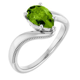 Pear Peridot Solitaire Ring in Gold and Platinum
