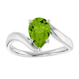 Pear Peridot Solitaire Ring in Gold and Platinum