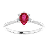 Pear Ruby Accented Ring with Diamond Accents in Gold and Platinum