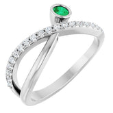Round Emerald Accented Ring with Diamond Accents in Platinum