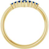 Round Blue Sapphire Accented Ring in Yellow Gold