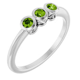 Round Peridot Three Stone Ring in Gold