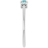 Round Blue Zircon Three Stone Ring in Platinum