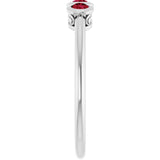 Round Ruby Three Stone Ring in Platinum
